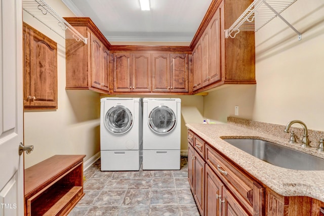 106 Woodmere Ln, Goldsboro, NC 27530 - laundry room with independent washer and dryer, cabinet space, and ornamental molding