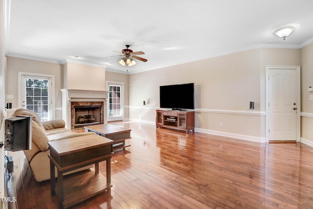 106 Woodmere Ln, Goldsboro, NC 27530 - living area with a ceiling fan, wood finished floors, a high end fireplace, and ornamental molding