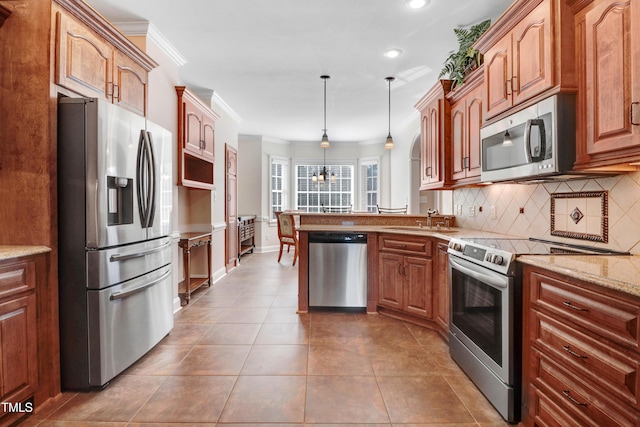 106 Woodmere Ln, Goldsboro, NC 27530 - kitchen featuring stainless steel appliances, ornamental molding, decorative backsplash, light stone counters, and recessed lighting