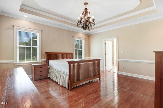 106 Woodmere Ln, Goldsboro, NC 27530 - bedroom featuring a tray ceiling, a chandelier, hardwood / wood-style floors, crown molding, and recessed lighting