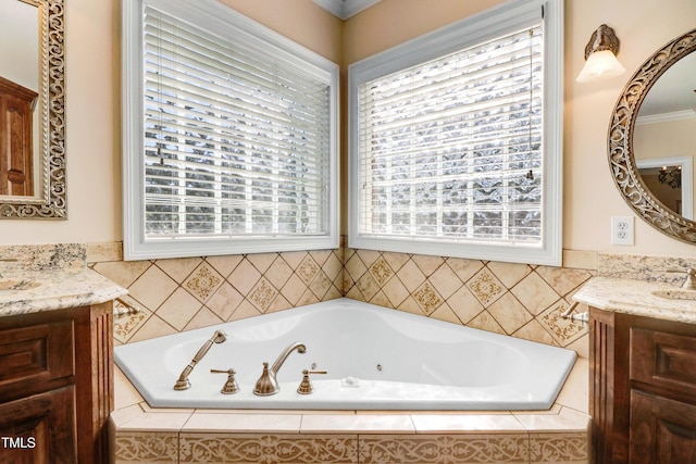 106 Woodmere Ln, Goldsboro, NC 27530 - full bathroom with two vanities, a jetted tub, and healthy amount of natural light