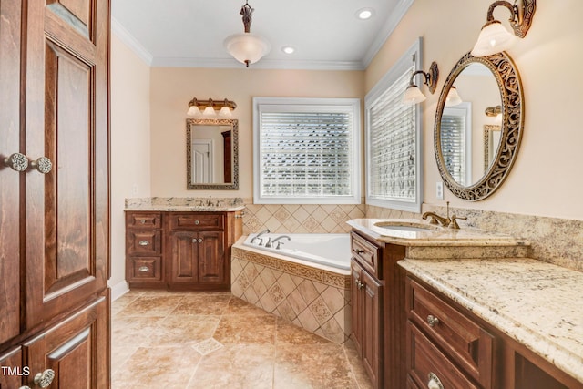 106 Woodmere Ln, Goldsboro, NC 27530 - bathroom featuring crown molding, a garden tub, two vanities, and recessed lighting