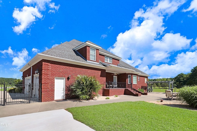 106 Woodmere Ln, Goldsboro, NC 27530 - view of front of home featuring a ceiling fan, brick siding, roof with shingles, and a porch