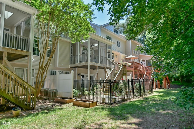 119 Jones Creek Pl Unit 119, Chapel Hill, NC 27516 - rear view of property featuring stairway, a ceiling fan, and a sunroom