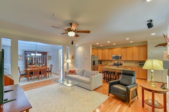 119 Jones Creek Pl Unit 119, Chapel Hill, NC 27516 - living room with light wood finished floors, a chandelier, a ceiling fan, and recessed lighting