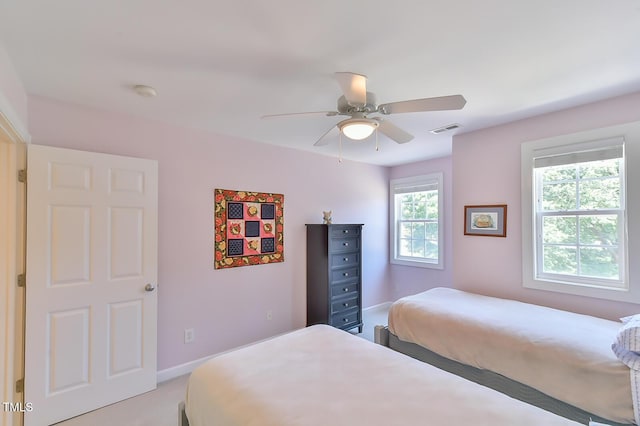 119 Jones Creek Pl Unit 119, Chapel Hill, NC 27516 - bedroom featuring multiple windows, light colored carpet, and ceiling fan