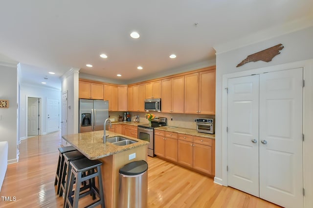 119 Jones Creek Pl Unit 119, Chapel Hill, NC 27516 - kitchen featuring stainless steel appliances, light brown cabinetry, recessed lighting, light wood-type flooring, and crown molding
