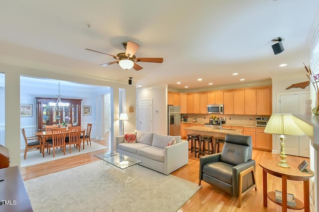 119 Jones Creek Pl Unit 119, Chapel Hill, NC 27516 - living area featuring light wood-style flooring, a chandelier, ceiling fan, and recessed lighting
