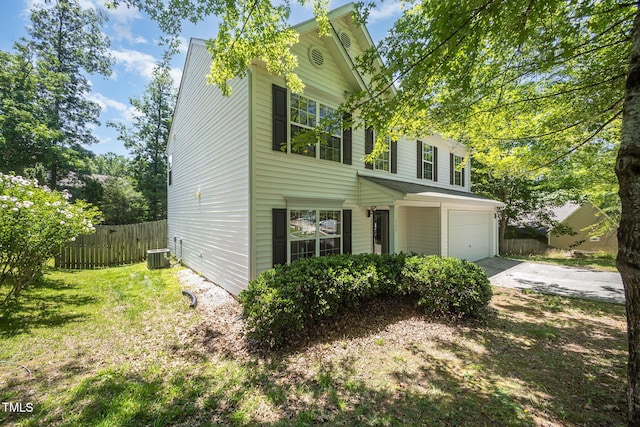 709 Woodgreen Dr, Durham, NC 27704 - view of front of house with a garage and driveway