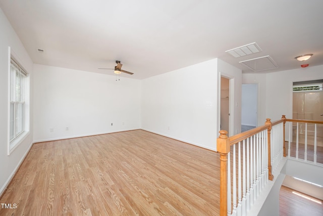 709 Woodgreen Dr, Durham, NC 27704 - spare room with attic access, light wood-style flooring, and a ceiling fan