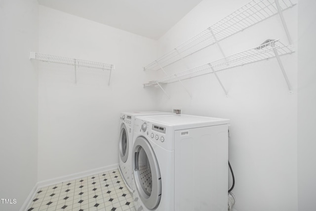 709 Woodgreen Dr, Durham, NC 27704 - laundry area with independent washer and dryer and light flooring