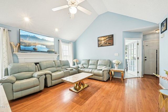 2636 Scattered Oak Ct, Raleigh, NC 27603 - living area with lofted ceiling, wood finished floors, and ceiling fan