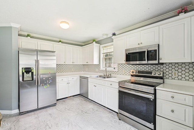 2636 Scattered Oak Ct, Raleigh, NC 27603 - kitchen featuring stainless steel appliances, light marble finish flooring, crown molding, light countertops, and decorative backsplash