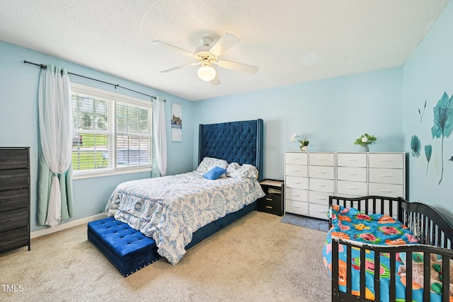 2636 Scattered Oak Ct, Raleigh, NC 27603 - carpeted bedroom with a textured ceiling and a ceiling fan
