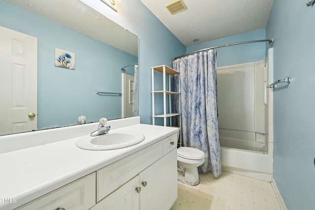 2636 Scattered Oak Ct, Raleigh, NC 27603 - full bath with vanity, tile patterned floors, shower / tub combo, and a textured ceiling