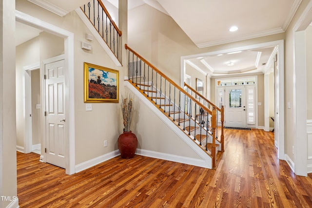 2129 Glade Valley Ln, Morrisville, NC 27560 - entrance foyer featuring stairway, wood finished floors, crown molding, and recessed lighting