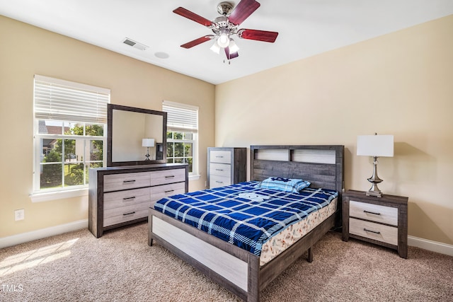 2129 Glade Valley Ln, Morrisville, NC 27560 - bedroom with light carpet and a ceiling fan