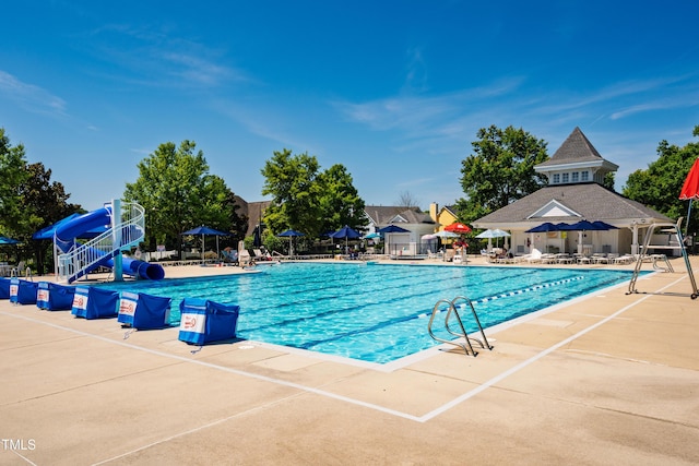2129 Glade Valley Ln, Morrisville, NC 27560 - community pool featuring a patio area and a water slide