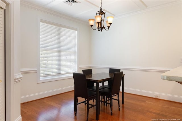 3310 Starboard Way Unit 301, Fayetteville, NC 28314 - dining space with a chandelier, healthy amount of natural light, wood finished floors, and ornamental molding