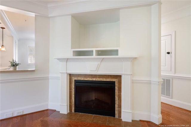 3310 Starboard Way Unit 301, Fayetteville, NC 28314 - detailed view of a fireplace, ornamental molding, and wood finished floors