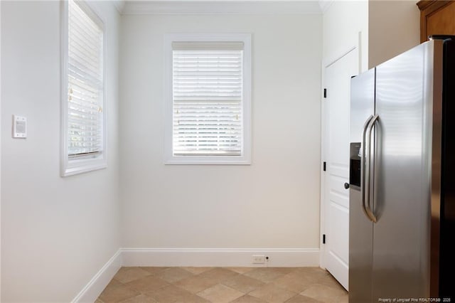 3310 Starboard Way Unit 301, Fayetteville, NC 28314 - kitchen with stainless steel refrigerator with ice dispenser, plenty of natural light, and ornamental molding