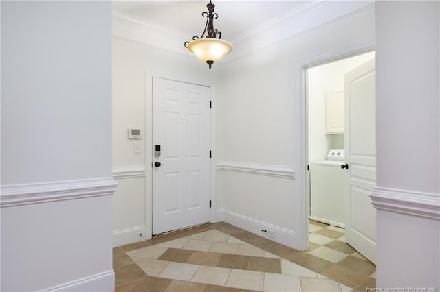 3310 Starboard Way Unit 301, Fayetteville, NC 28314 - entryway featuring washer / clothes dryer, crown molding, and light tile patterned floors