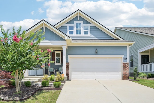 833 Atticus Way, Durham, NC 27703 - craftsman-style house with a porch, brick siding, driveway, and board and batten siding