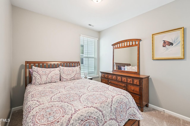 833 Atticus Way, Durham, NC 27703 - carpeted bedroom with baseboards