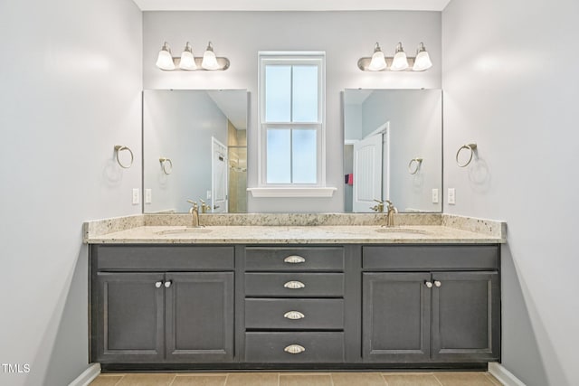 833 Atticus Way, Durham, NC 27703 - bathroom with double vanity and tile patterned flooring