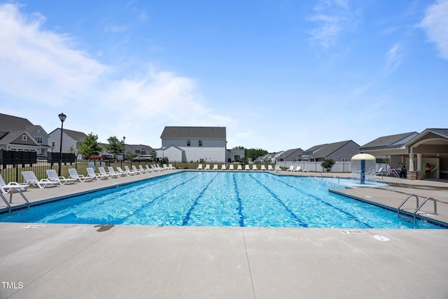 22 Combine Trl, Benson, NC 27504 - community pool featuring a patio and a residential view