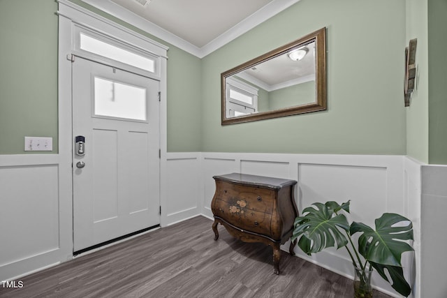 22 Combine Trl, Benson, NC 27504 - entrance foyer featuring crown molding, wood finished floors, a wainscoted wall, and a decorative wall