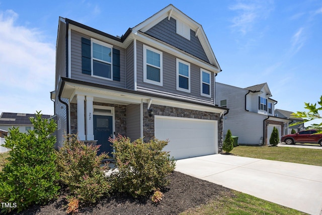 22 Combine Trl, Benson, NC 27504 - view of front of house with an attached garage, driveway, and stone siding
