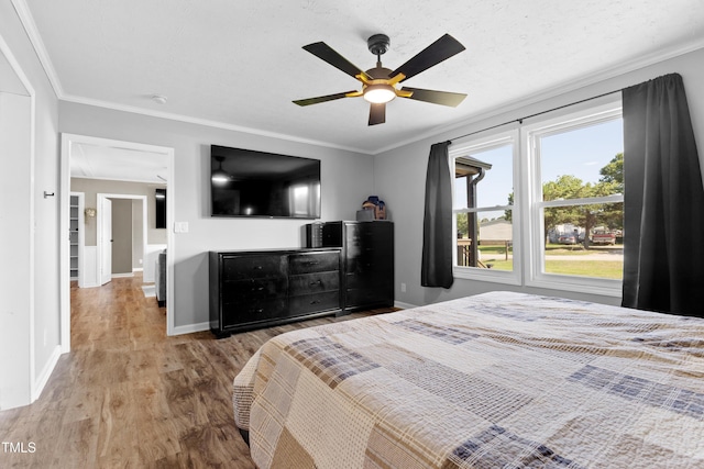 10 Wilders Ln, Louisburg, NC 27549 - bedroom with wood finished floors, ornamental molding, and a ceiling fan