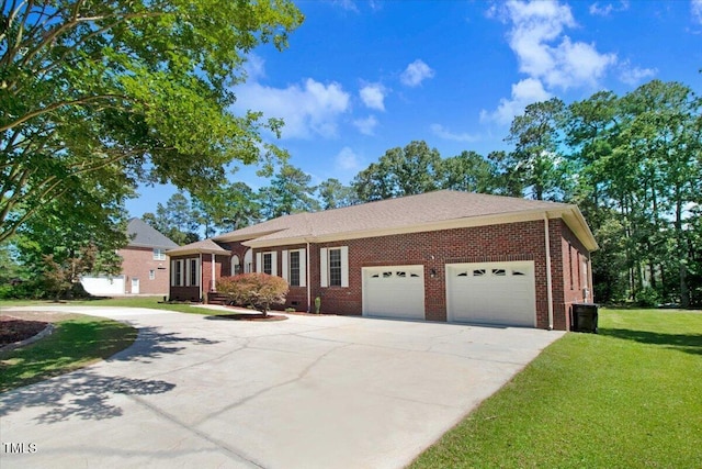 206 Tramway Pl, Goldsboro, NC 27534 - single story home with driveway, an attached garage, brick siding, and a front lawn