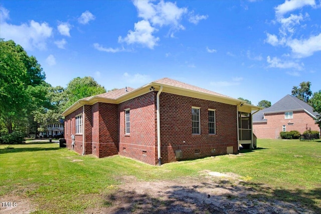 206 Tramway Pl, Goldsboro, NC 27534 - view of side of property with crawl space, brick siding, and a yard