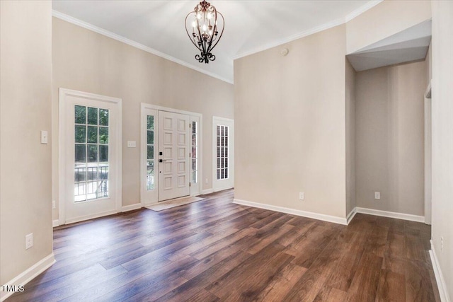 206 Tramway Pl, Goldsboro, NC 27534 - foyer with a chandelier, dark wood-type flooring, and crown molding