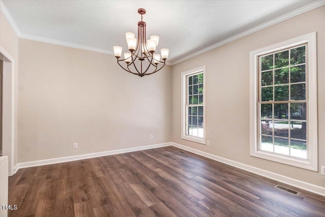 206 Tramway Pl, Goldsboro, NC 27534 - unfurnished room with dark wood finished floors, healthy amount of natural light, a chandelier, and crown molding