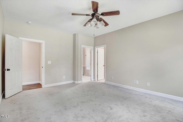 206 Tramway Pl, Goldsboro, NC 27534 - unfurnished bedroom with carpet, connected bathroom, and a ceiling fan