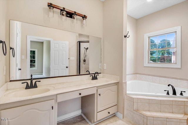 206 Tramway Pl, Goldsboro, NC 27534 - bathroom featuring a bath, double vanity, and a stall shower