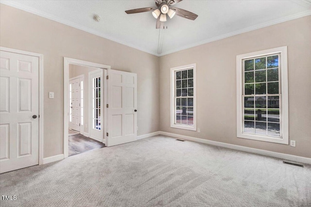 206 Tramway Pl, Goldsboro, NC 27534 - unfurnished bedroom with carpet floors, crown molding, and a ceiling fan