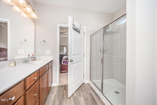 614 Marian Way, Sanford, NC 27330 - ensuite bathroom featuring wood finished floors, vanity, and a stall shower