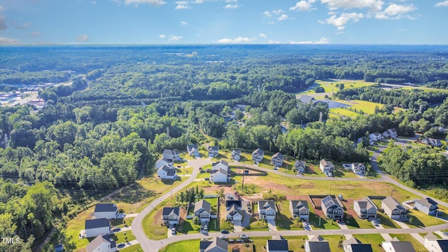 614 Marian Way, Sanford, NC 27330 - aerial view of residential area featuring a heavily wooded area