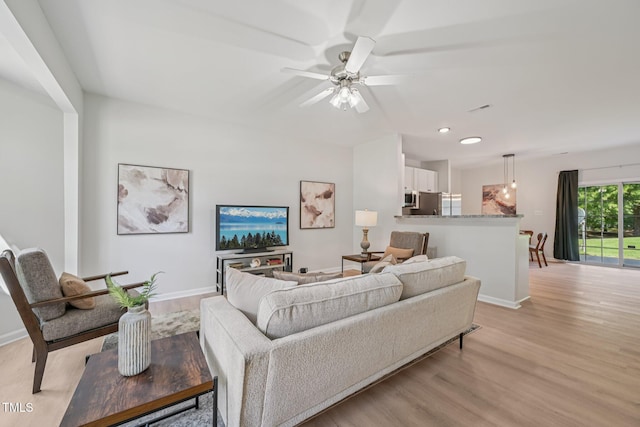 3973 Volkswalk Pl, Raleigh, NC 27610 - living area featuring light wood-type flooring, a ceiling fan, and recessed lighting