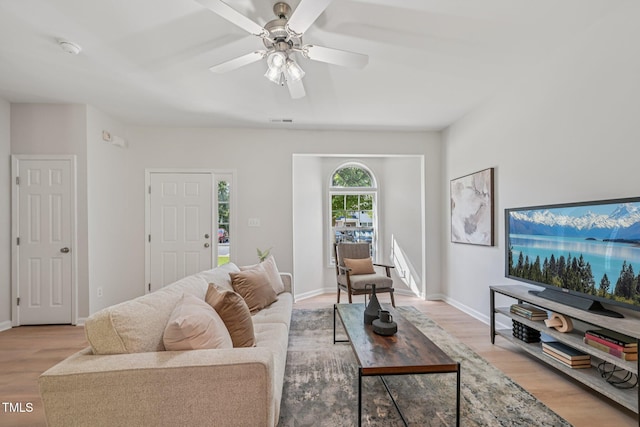 3973 Volkswalk Pl, Raleigh, NC 27610 - living area with light wood finished floors and a ceiling fan