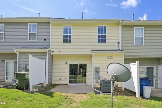 3973 Volkswalk Pl, Raleigh, NC 27610 - back of property featuring a patio and a lawn