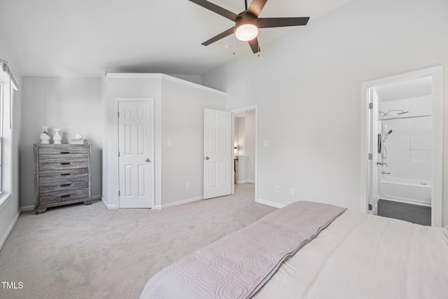 3973 Volkswalk Pl, Raleigh, NC 27610 - bedroom featuring carpet, connected bathroom, lofted ceiling, and ceiling fan