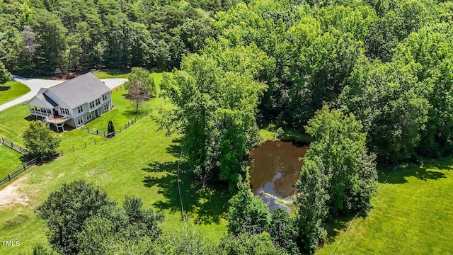 3511 Corbett Rd, Mebane, NC 27302 - view from above of property featuring a nearby body of water and a heavily wooded area