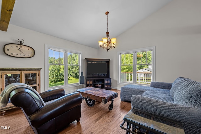 3511 Corbett Rd, Mebane, NC 27302 - living room with a chandelier, plenty of natural light, hardwood / wood-style flooring, and high vaulted ceiling