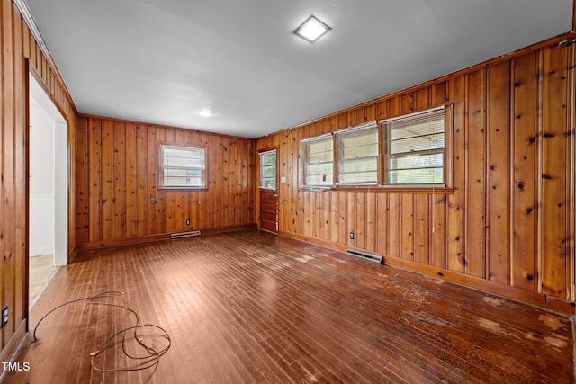 2512 Mckinney St, Burlington, NC 27217 - empty room with wood-type flooring and wood walls