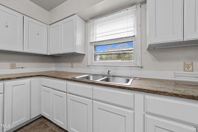 2512 Mckinney St, Burlington, NC 27217 - kitchen featuring a sink and white cabinetry
